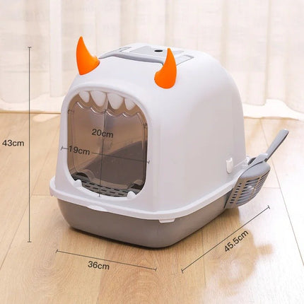 Caja de arena para gatos con forma de concha de monstruo pequeño