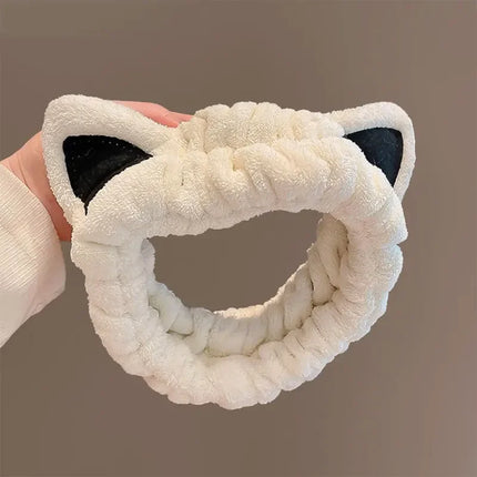 Bonita diadema de peluche con orejas de gato para lavarse la cara y aplicar mascarillas