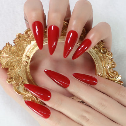 Uñas postizas glamorosas en rojo con forma de stiletto: longitud media