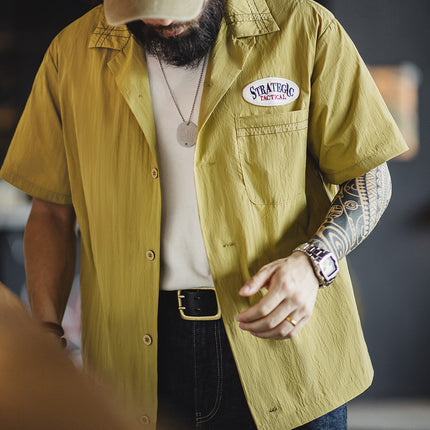 Camisa vintage de manga corta con cuello cubano y bordado