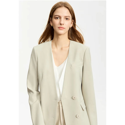 Blazer élégant à col en V avec ceinture et épaulettes