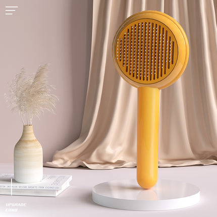 Brosse de toilettage autonettoyante pour chiens et chats