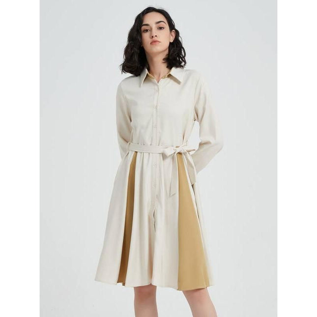 Elegante vestido beige de manga larga en forma de A con cinturón
