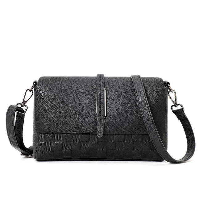 Elegante bolso de hombro tejido de piel de vaca negra: bolso de mano de moda con un diseño tejido único