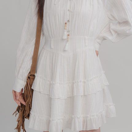 Vestido blanco con borlas atadas de moda para mujer