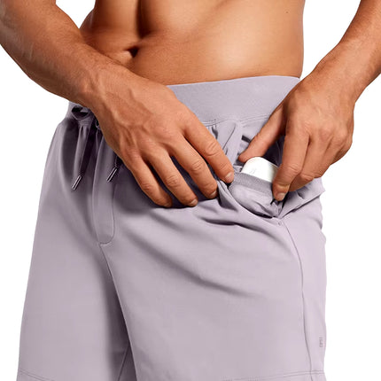 Pantalones cortos de entrenamiento elásticos en cuatro direcciones de 5"