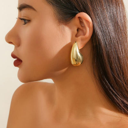 Boucles d'oreilles à tige en forme de dôme en forme de goutte d'eau épaisse et dorée à la mode