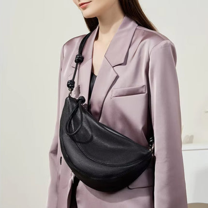 Sac à bandoulière minimaliste en cuir souple