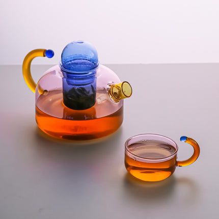 Juego de tetera y taza de té de vidrio de colores