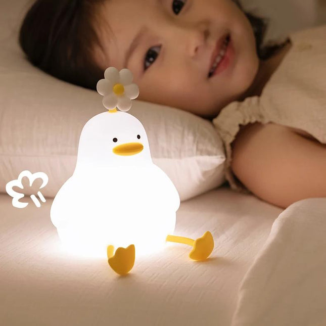 Encantadora luz de noche con forma de pato y flor