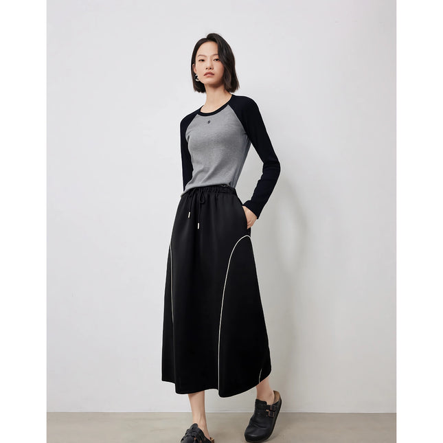 Falda elegante de otoño de longitud media en forma de A con cintura elástica