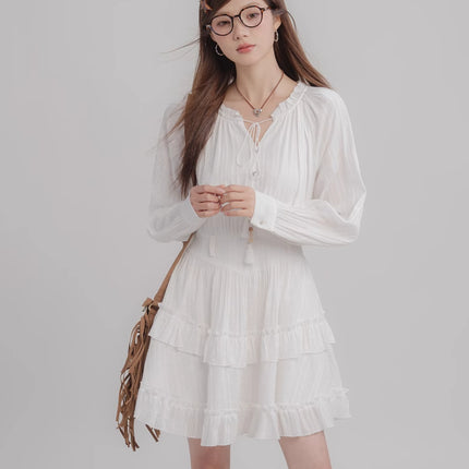 Vestido blanco con borlas atadas de moda para mujer